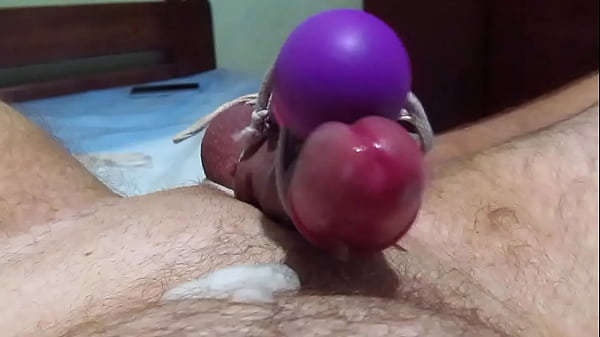 Play MP4 - man solo cums from a toy tied to a dick - slow motion