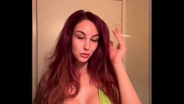 Italian Big Tits Milf Artemisia Love showing her juicy tits in a micro bikini while smoking a cigarette