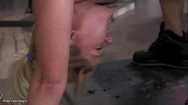 Blond in inverted horizontal suspension