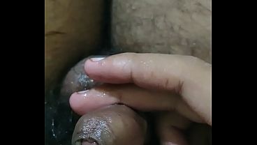 Gay dropping lots of oil on sweet cock