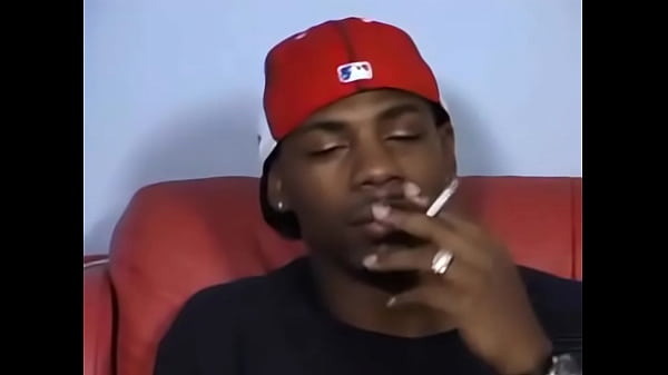 Balck gays fucking on red armchair 