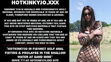 Hotkinkyjo in fishnet self anal fisting &amp_ prolapse in the shallow water at sand mine