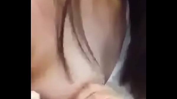 Girl showing her medium size melons.