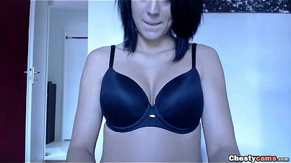 Cute brunette shows her jeans 