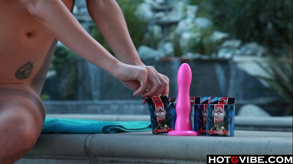 Big Titted Blonde gives herself orgasms_by the pool