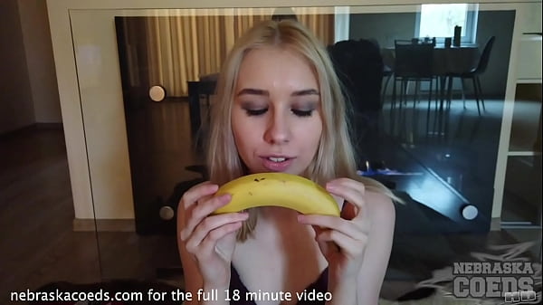 Super hot girl eating and playing with bananas