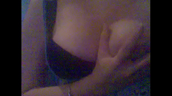 Playing with her boobs