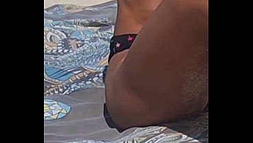 It was so hot at the beach that I had to take off my bikini.