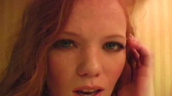 Redhead nylons babe rubs her pussy 