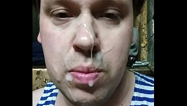 Gay cums and covers his whole fucking face with fresh cum!