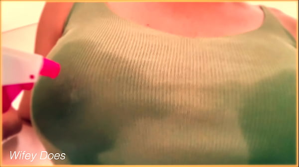 MILF braless with amazing tits in tight shirts and pours water on them 