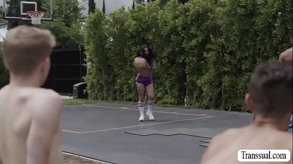 Latina TS Eva Maxim plays basketball with the guys in the court.After that,she throats their hard big cocks passionately and in return,the guys bareback fucks her tight wet ass so deep and fucking hard. 