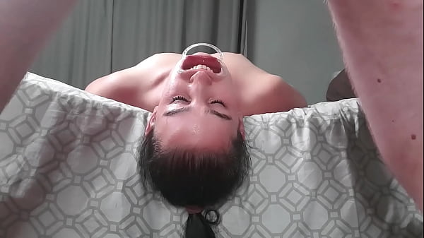 Upside down piss loving whore laying face down from bed_swallows piss in two non identical_camera angles