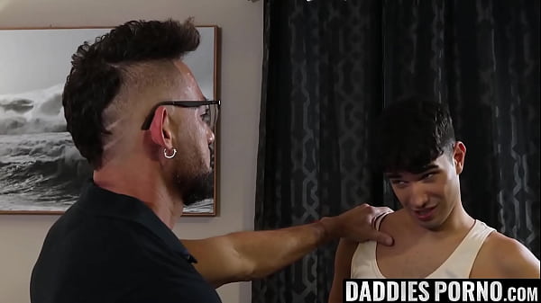 Eager to see what his stepson can do, Miguel surprises Rob by pulling out his massive cock. Stunned, Rob gets on his knees and starts sucking it. 