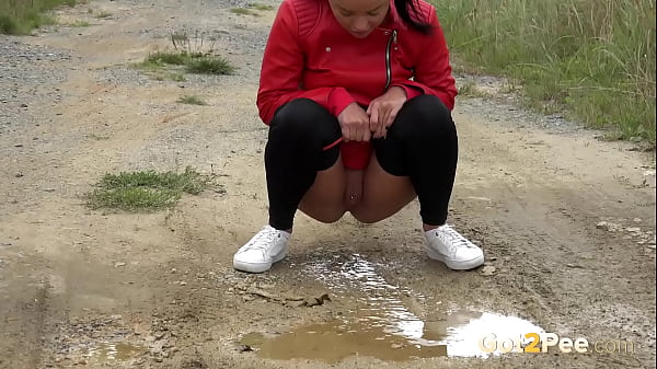 Got2pee Brings Another Desperately Peeing Girl In Red Leather - Featuring Big Puddle thumbnail