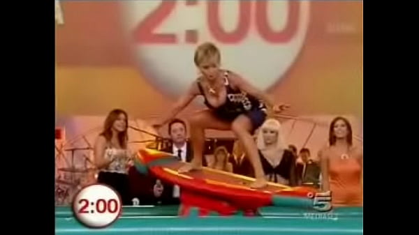 Another hot lady takes part in the indoor surfing game on buono domenica which inevitibly leads to upskirts and downblouse moments 