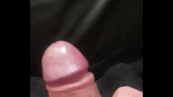 Pulling back the foreskin nice and slow 