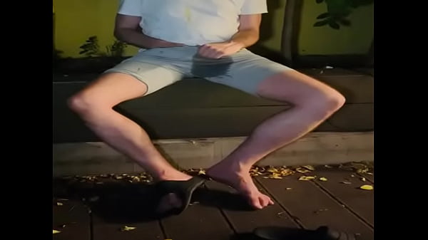 Amateur boy pees himself in the garden (wets his grey shorts, grey undies and white tshirt)