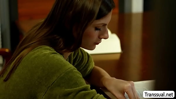 Curvy Ladyboy Amanda Riley is in the library reading books and suddenly, Robby Apples arrives and he lets her throat his hard big dick 