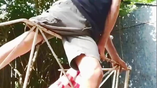 Play MP4 - Groin Stretch and pain relief on Rail with shorts and t-shirt