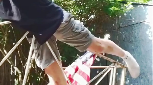 Groin_Stretch_and painrelief_on Rail_with shorts and_t shirt