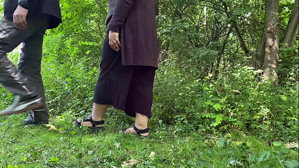 Sexy milf takes off her pants and pisses next to me in a public park doggystyle