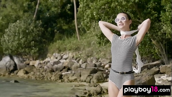 Petite brunette european babe stripping on the rocks 