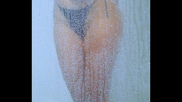 Tanned campus hottie rinses off in her bikini after a long day
