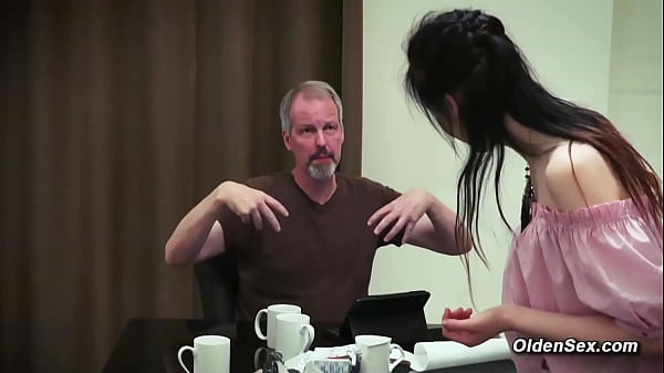 Teen seduces and fucks stepdad in the kitchen