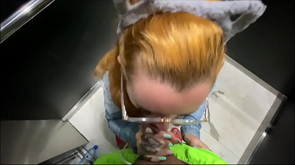 Naughty neighbor sucking dick in the building's elevator for the doorman to watch 