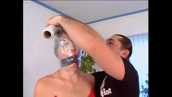 Immobilized with cellophane and fucked behind 