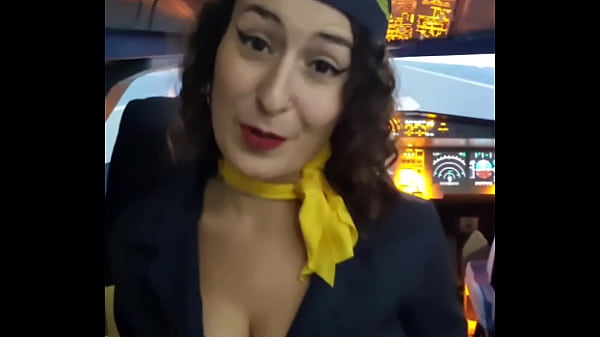The flight attendant puts a dildo in her pussy on board 