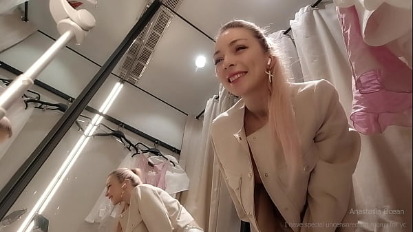 Play MP4 - Online date in fitting room with open curtain&period; Public video call&period;
