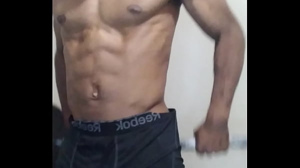 Workout at work while waiting to empty huge truck getting_oiled up and_sweaty