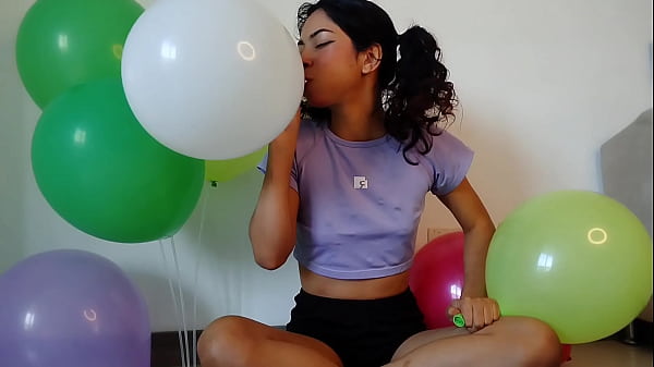 Pigtailed blowing and having fun