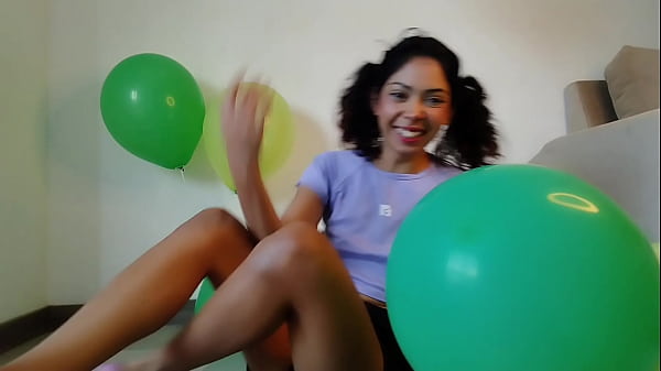 Pigtailed blowing and having fun