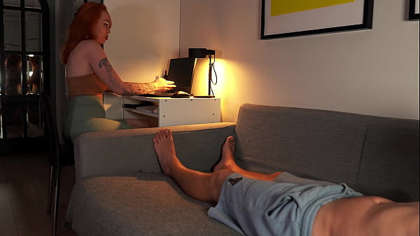 Nerdy redhead reveals tits while sucking cock 