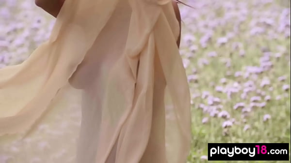 Hothungarian beauty Natalie Costello stripping ata flowery field outdoor