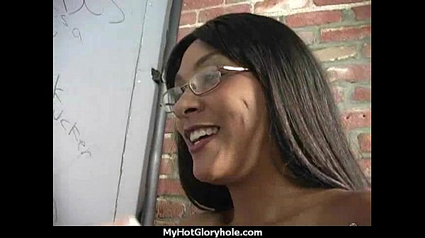 Ebony teen shows offher blowjob skills at gloryhole28
