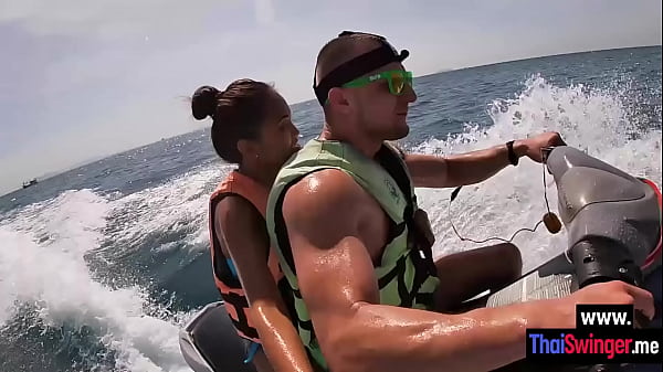 Cute Thai teen enjoyed guys dick while sucking it outdoor 