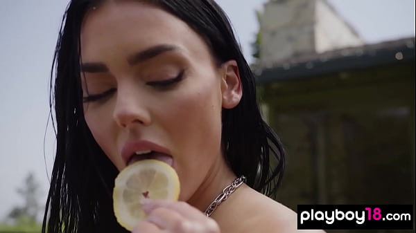 Busty nude brunette muse flashing her shaved pussy on the counter 