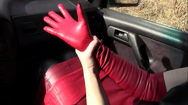 Wife In Handcuffs And Leather Gloves Doing A Handjob In The Car thumbnail